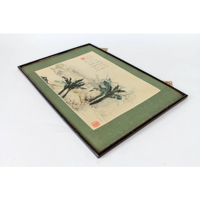 Vintage Japanese print with painted black carved wood frame and silk matting with bird motif. Brass accents for hanging....