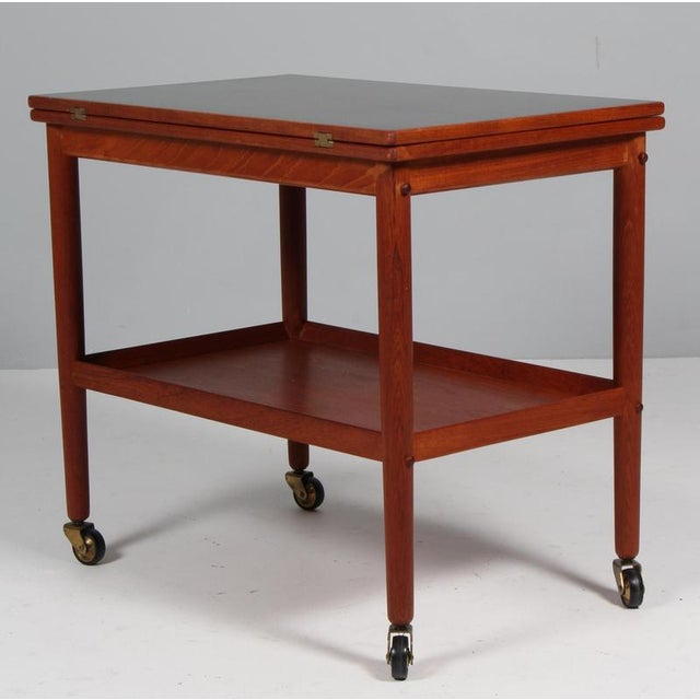 Ole Wanscher bar cart / tray cart with frame of teak. Foldable top with a width of 45/90 cm. with formica top. Model...