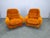 A bold and sculptural pair of Space Age lounge chairs, produced in Italy in the 1970s. Defined by their low-profile,...