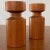 Pair of vintage solid teak candle holders with brass inserts marked "Made In Denmark" on bases. Ships quickly via USPS.