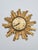 An original decorative wall clock bearing the “Electrica” signature, crafted in the striking form of a sunburst. The...