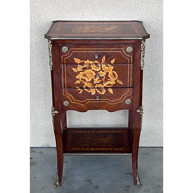 A very fine Louis XV Italian side tables or nightstands with elegant marquetry work, all original unrestored. This...