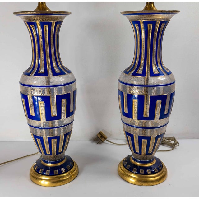 We are selling this exceptional pair of Bohemian cameo glass vases. These vases are blue cut to clear with white speckles...