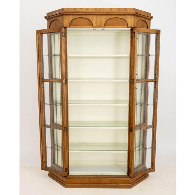 Neoclassical Style Fruitwood and Glass Vitrine, with four glass panels and two doors opening to lighted interior with six...