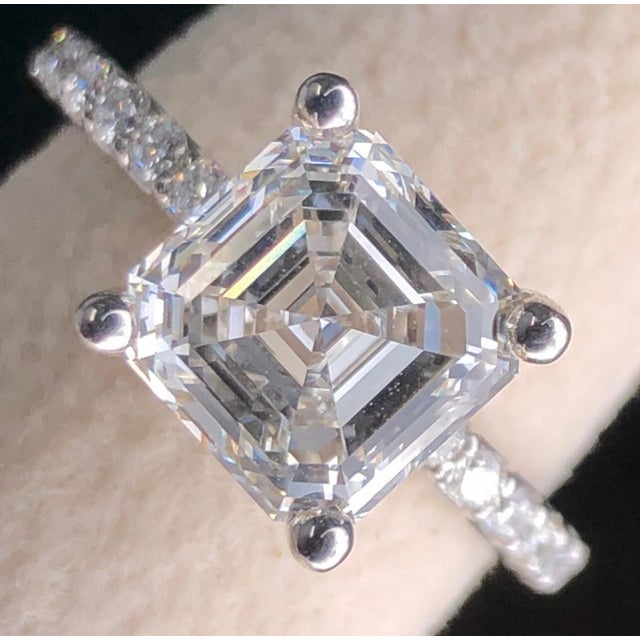 Stunning 3 Carat Square Emerald (Asscher Cut) VS clarity brilliant lab grown diamond engagement ring in 14k white gold. A...