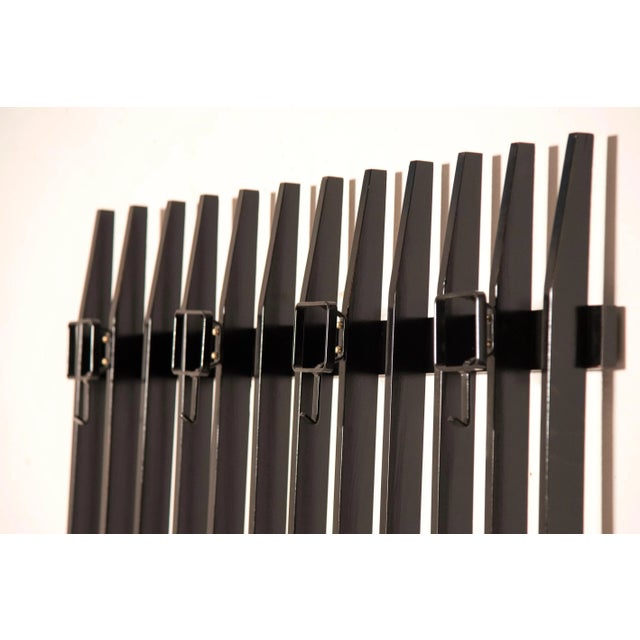 Coat rack from the 1960s, Italy In ebonized black lacquered wood. Carried out conservative restoration and polishing...