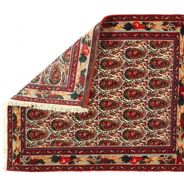 This is a Persian sene lamb's wool and cotton rug. Vegetable Dyed. This rug has a dense, soft pile, and excellent quality,...