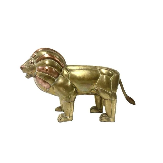 Brass and Copper Lion Sculpture. Possibly made by the acclaimed Mexican artist and sculptor, Sergio Bustamante. This piece...