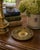 A richly detailed late 19th century gilt bronze shallow dish in the Grand Tour tradition, cast with a central classical...