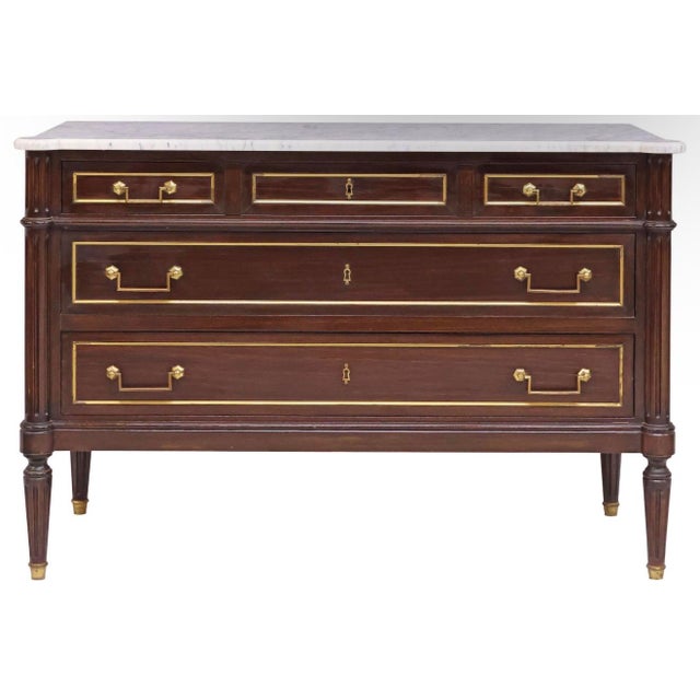 An elegant nod to Parisian taste, this Imported 1930s Louis XVI-style marble-top commode blends refined symmetry with...