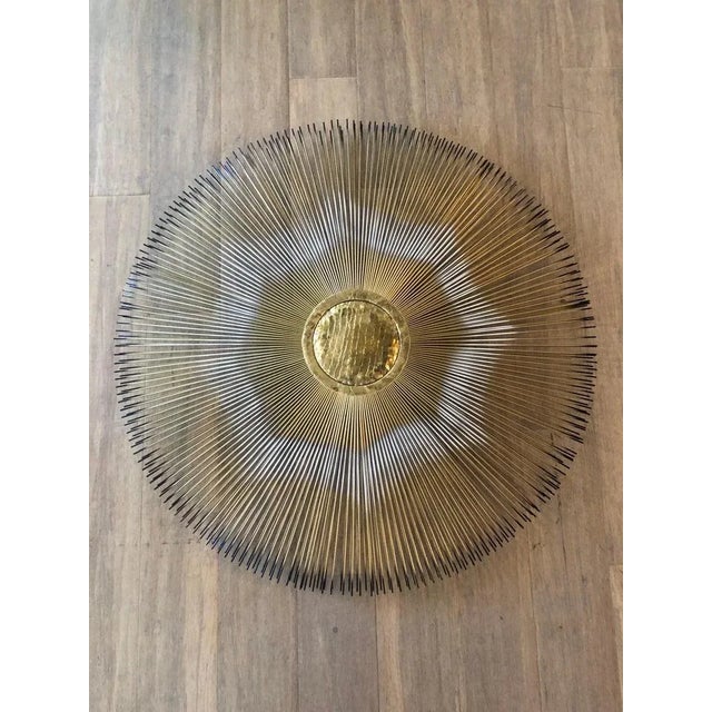 1970's Signed Casa Devall starburst wall sculpture. Quite a Glamorous statement piece . Mixing metals in with artwork is...
