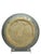Hand-thrown stoneware plate by a studio potter, signed on the underside (mark partially legible, appears to end in “…man”...