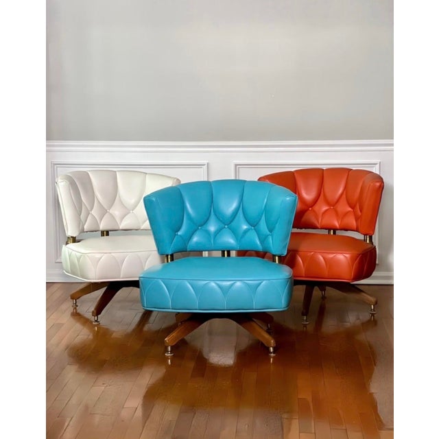 Rare set of three vintage 1960s swivel lounge chairs attributed to Kroehler. A fabulous set with original faux leather...