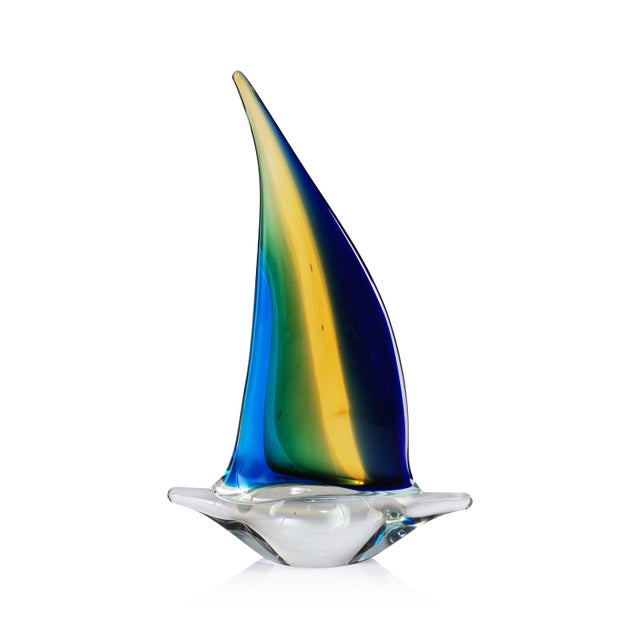 Inspired by the beauty of the sea, the Marisol Decorative Glass Sailboats add a serene touch to any space. Crafted in blue...
