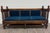 This is a stunning antique Jacobean Revival oak hall settee, daybed, or bench featuring richly carved barley twist...