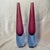 This is a pair of vintage mid-century Murano Sommerso art glass teardrop vases featuring a striking magenta or cranberry...