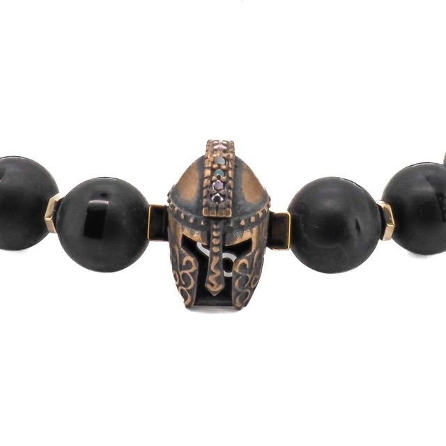 Black Onyx Stone Gladiator Charm Beaded Bracelet is a bold and striking piece of handmade jewelry that is perfect for any...