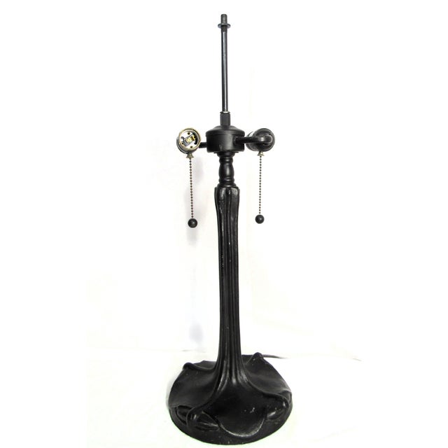 Super sweet Tiffany Regency style lamp, heavy solid iron, 26" tall, and base is about 8" wide. Double bulb, double pull...