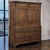 A beautifully proportioned late 18th century English Georgian oak linen press cupboard on chest, offering an exceptional...