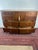 This Stately Lowboy Dresser with Lock offers a graceful blend of presence and practicality. Its gently bowed drawer fronts...
