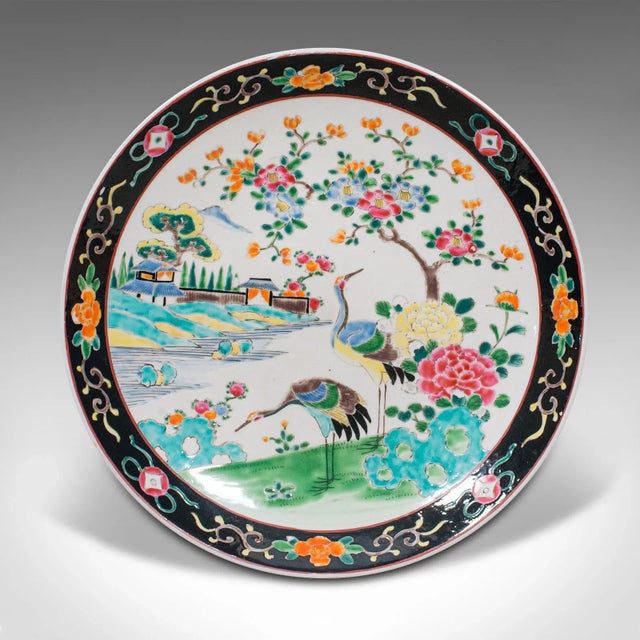 This is an antique Oriental fruit plate. A Japanese, handpainted ceramic charger or dish, dating to the late Victorian...