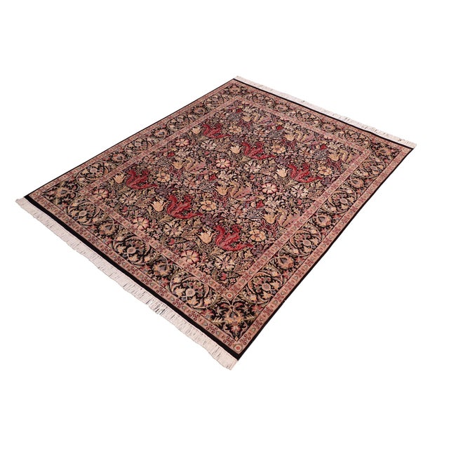 Designed with mesmerizing intricacy and gorgeous color palette, this hand-knotted masterpiece demonstrates the beauty and...