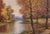 Peaceful landscape of a calm stream winding through an autumnal forest by Lorenz Griffith (American, 1889-1968). Signed...