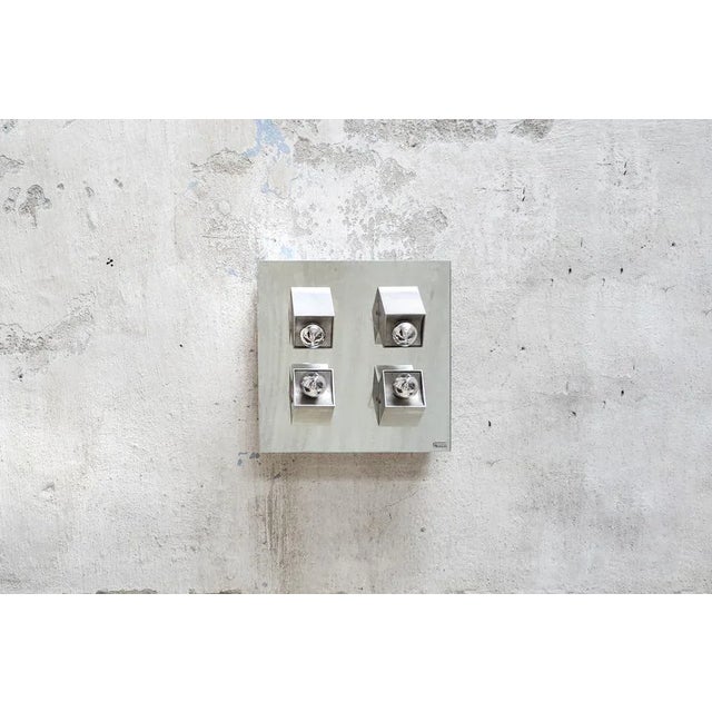 Applique four mirror lights, aluminum and satin steel. Eval manufacturer 70's This piece has an attribution mark, I am...