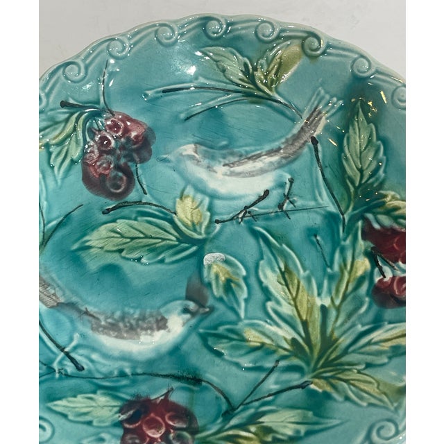 This is an antique French Majolica (Barbotine) plate, produced around the late 19th century to (circa 1890–1920). The...