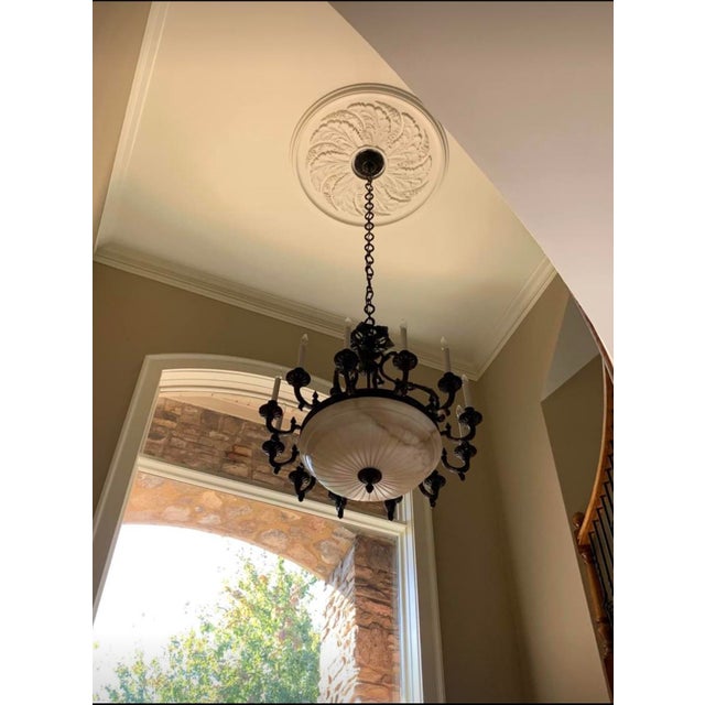 This chandelier was originally special ordered from Italy. Dimensions listed in this ad are approximate. 38” in diameter...