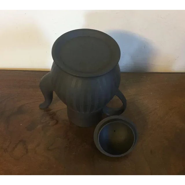 Antique 18th century English Wedgwood black basalt pottery engine turned coffee pot with lid. Measures 9" tall x 7 1/2"...