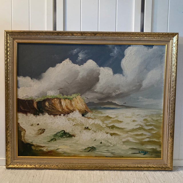 Bring the powerful beauty of the ocean indoors with this striking mid-century coastal seascape painting by Spanish artist...