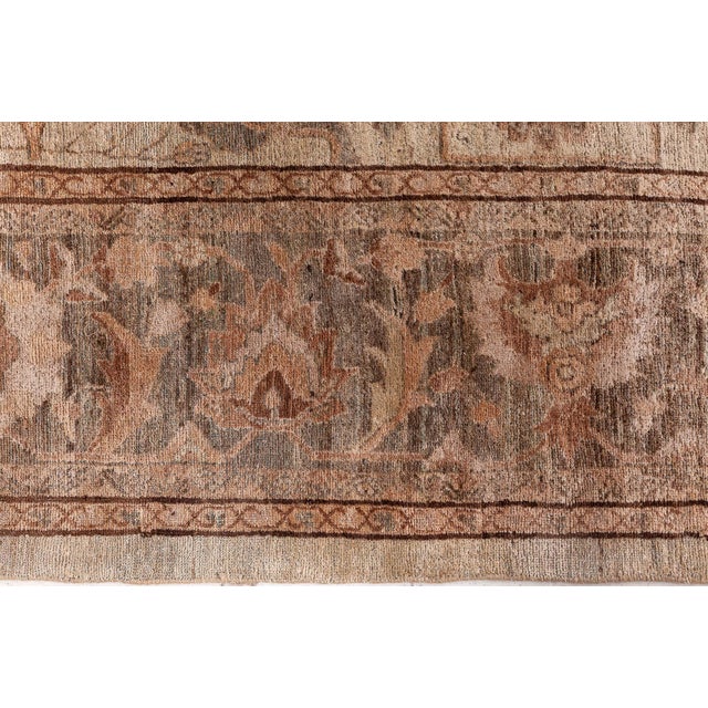 This magnificent antique rug before your eyes is a paragon of its superior craftsmanship. The main field of the venerable...