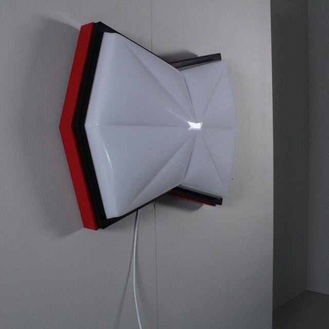 Space Age Style Red Ceiling Light, 1980, in Good conditions. Designed 1980 to 1989 Up to 250V (Europe/UK Standard).The...