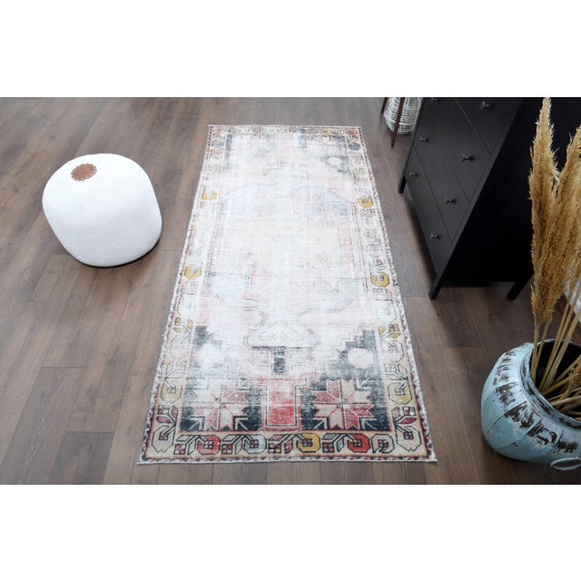 Vintage Persian Hand-Knotted runner rug is a semi-antique vintage runner rug. The '70s Eastern region of Anatolian's...