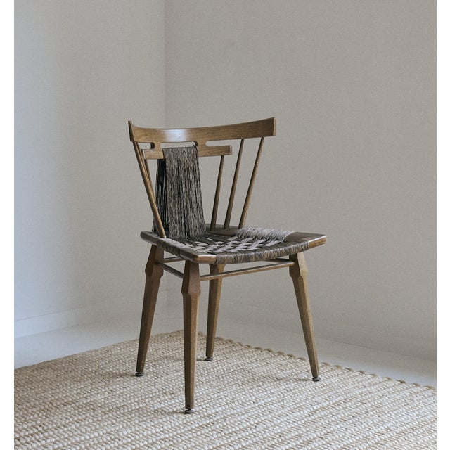 Pair of Edmond Spence chairs, mahogany wood and rush circa 1950s. The Mid Century Modern silhouette mixes perfectly with...
