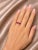 Metal: 14K White Gold Primary Stones: 5 Natural Oval Rubies Accent Stones: 8 Round Brilliant Diamonds Total Diamond...
