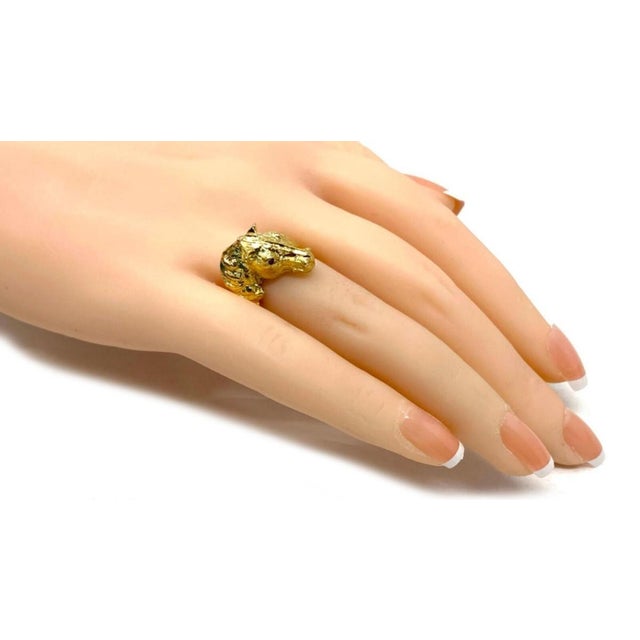 This unique vintage horse head ring is beautifully crafted in solid 18k yellow gold and designed with a detailed...