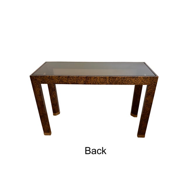 Mid-Century Faux Tortoise Shell Console Table with Black Glass by Henredon We know it’s hard to find one-of-a-kind pieces!...