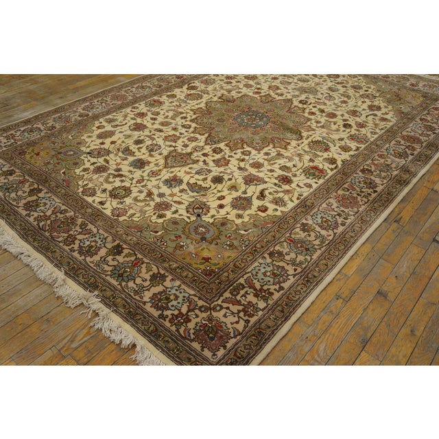 Antique Persian Tabriz, size: 6' 0'' x 8' 10''.