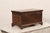 A Kashmiri wooden tabletop keepsake box with decorative floral inlay. This vintage wooden box from Kashmir, India is...