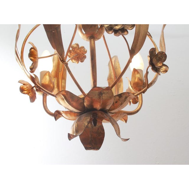 Golden hanging lamp, Design Hans Kögl (without a brand). with leaves and flowers. 3 flame for light bulbs it small thread....