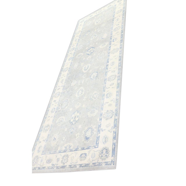 Turkish Oushak Rug Blue Ivory Handwoven Wool Runner 5'9" x 16'3" This Turkish Oushak runner is crafted from handwoven wool...