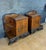 Pair of European Art Deco Nightstands, circa 1930s. Crafted in walnut veneer with striking symmetrical grain patterns,...