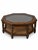 A distinctive vintage hexagonal coffee table combining warm wood tones, a smoked-glass inset top, and a woven cane lower...