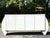 Make a bold statement with this striking vintage postmodern plaster credenza. Designed with sculptural curved side panels...