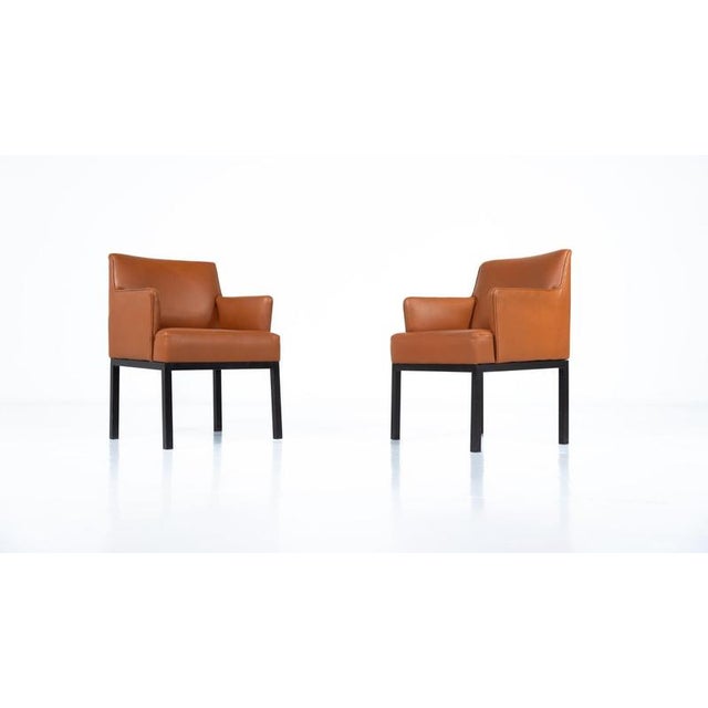 Mid-Century Pair of Armchairs Mod 56 by Jules Wabbes for Mobilier Universel, 1960s - New Leather This piece is attributed...