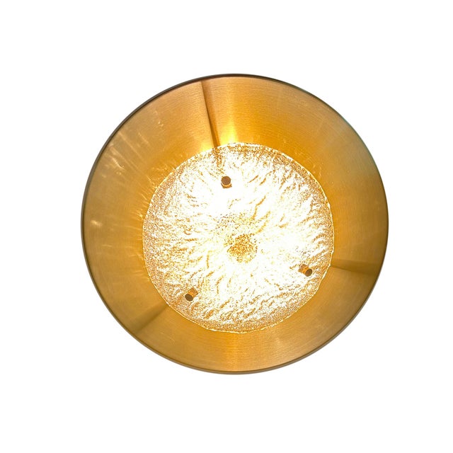 Very large Vintage mid century architectonic light, featuring an anodized light gold disc with a center murano glass cover...