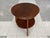 Originally hand-crafted in the Netherlands in the 1920s, this round Art Deco side table is white oak with a rich warm red-...