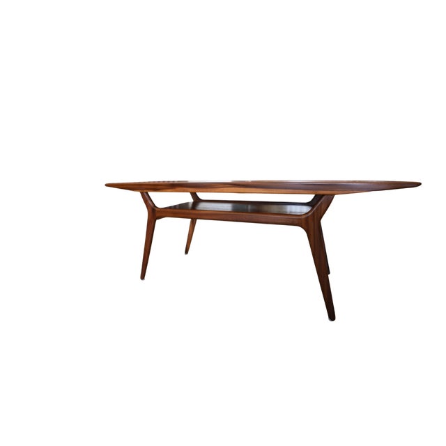 An elegant and very well-proportioned Danish coffee table in teak and walnut, made by Vamdrup Stolefabrik in Denmark. The...